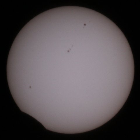 The Sun on May 21, 2012, 08:52 Japanese time, the Moon is about to leave the solar disc, (c) Michael Khan, 2012